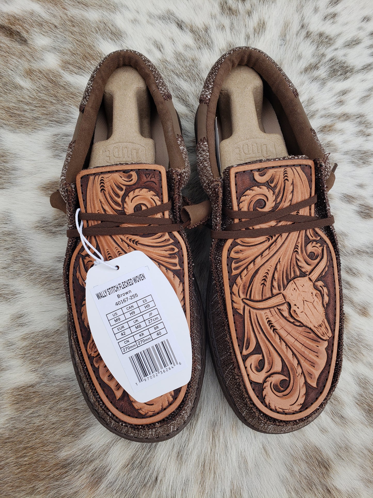 Men's size 9 loafers with custom tooled leather patches
