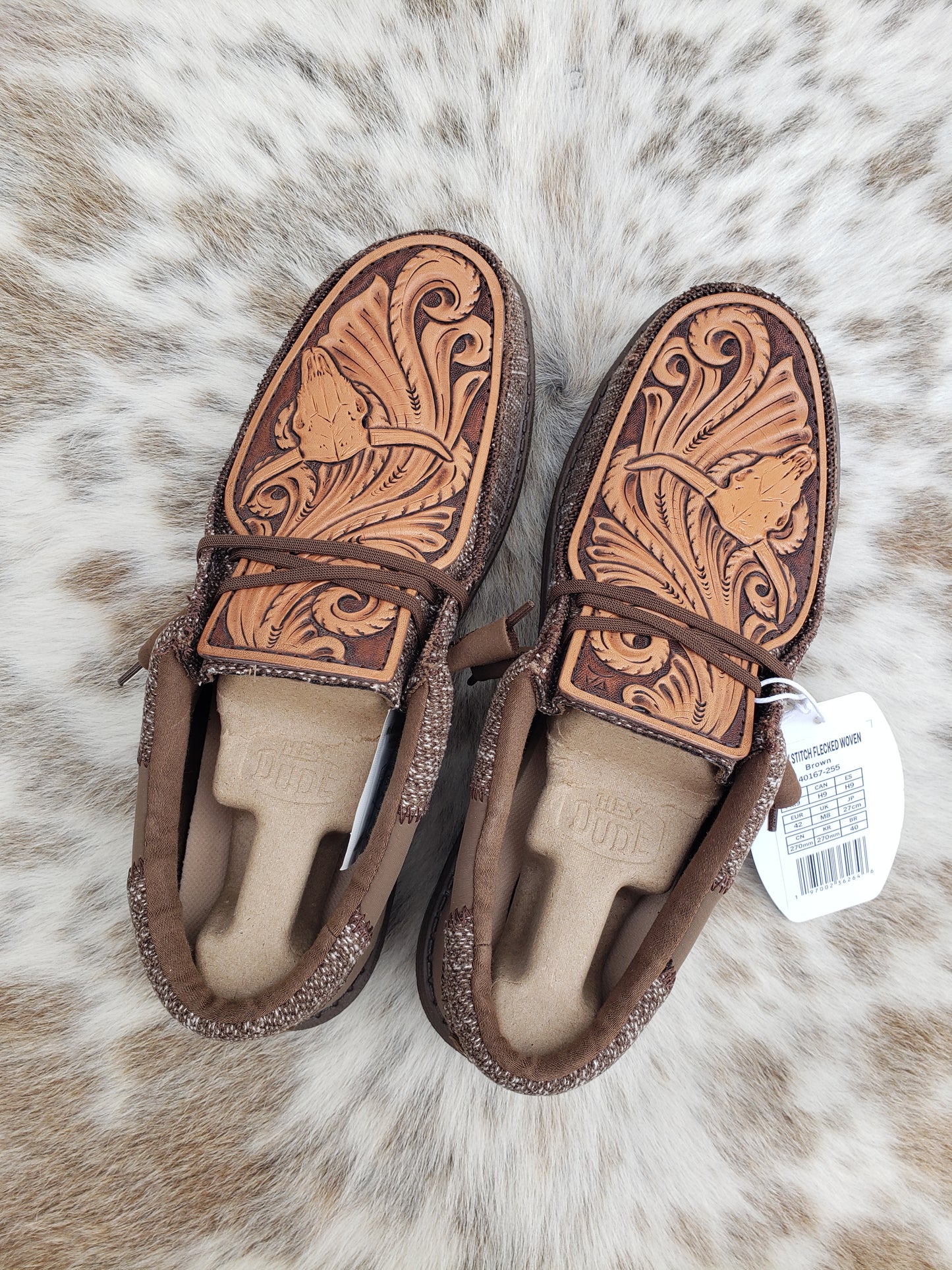 Men's size 9 loafers with custom tooled leather patches