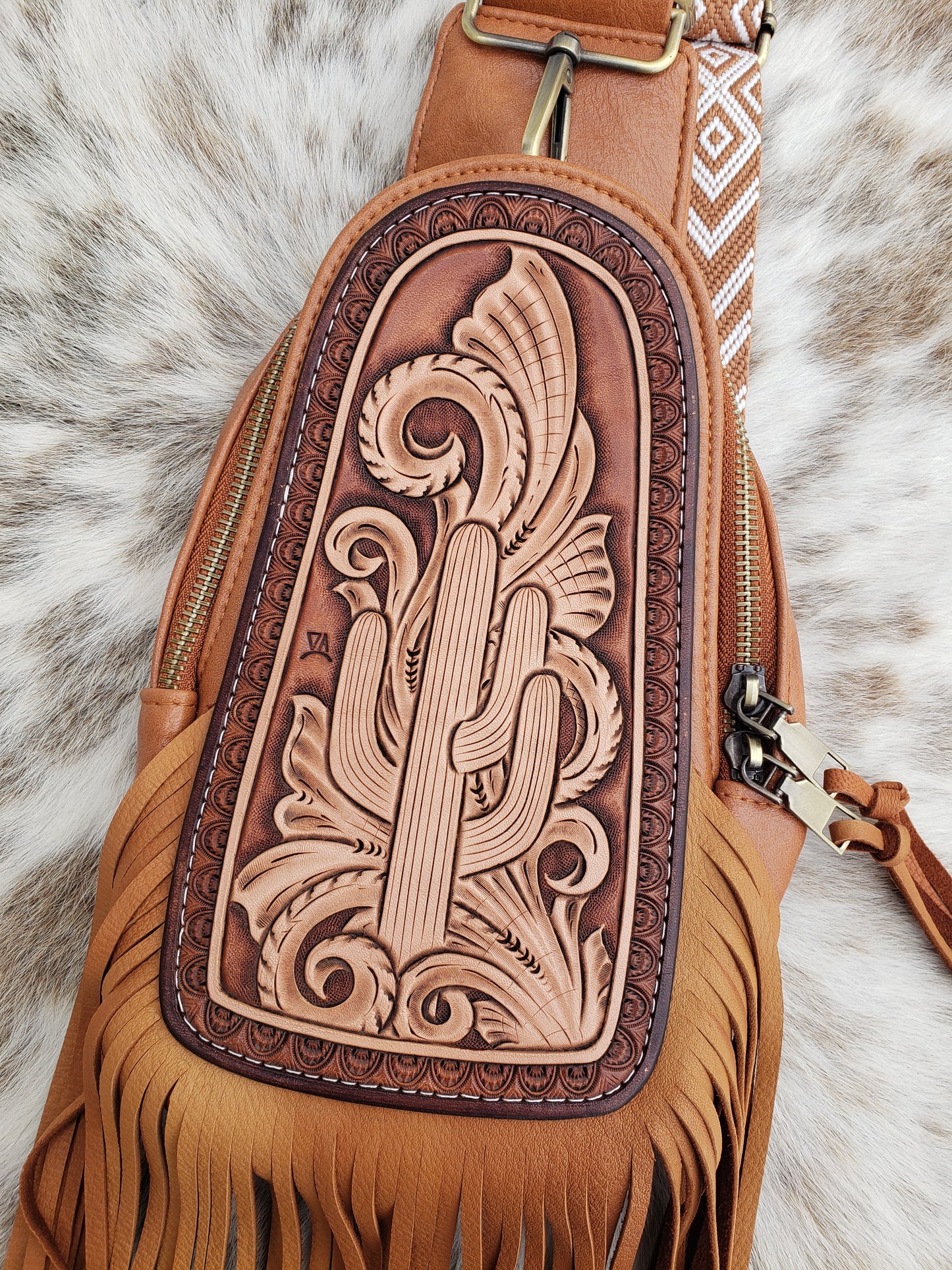 Small brown sling bag with cactus floral and fringe