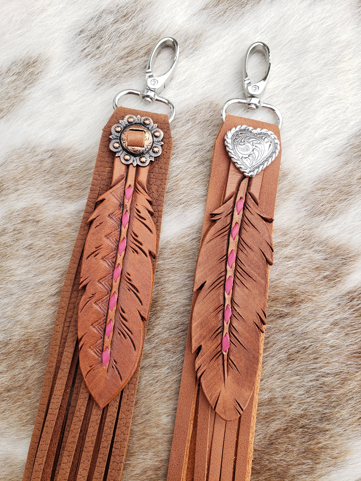 Pink buckstitch fringy feather