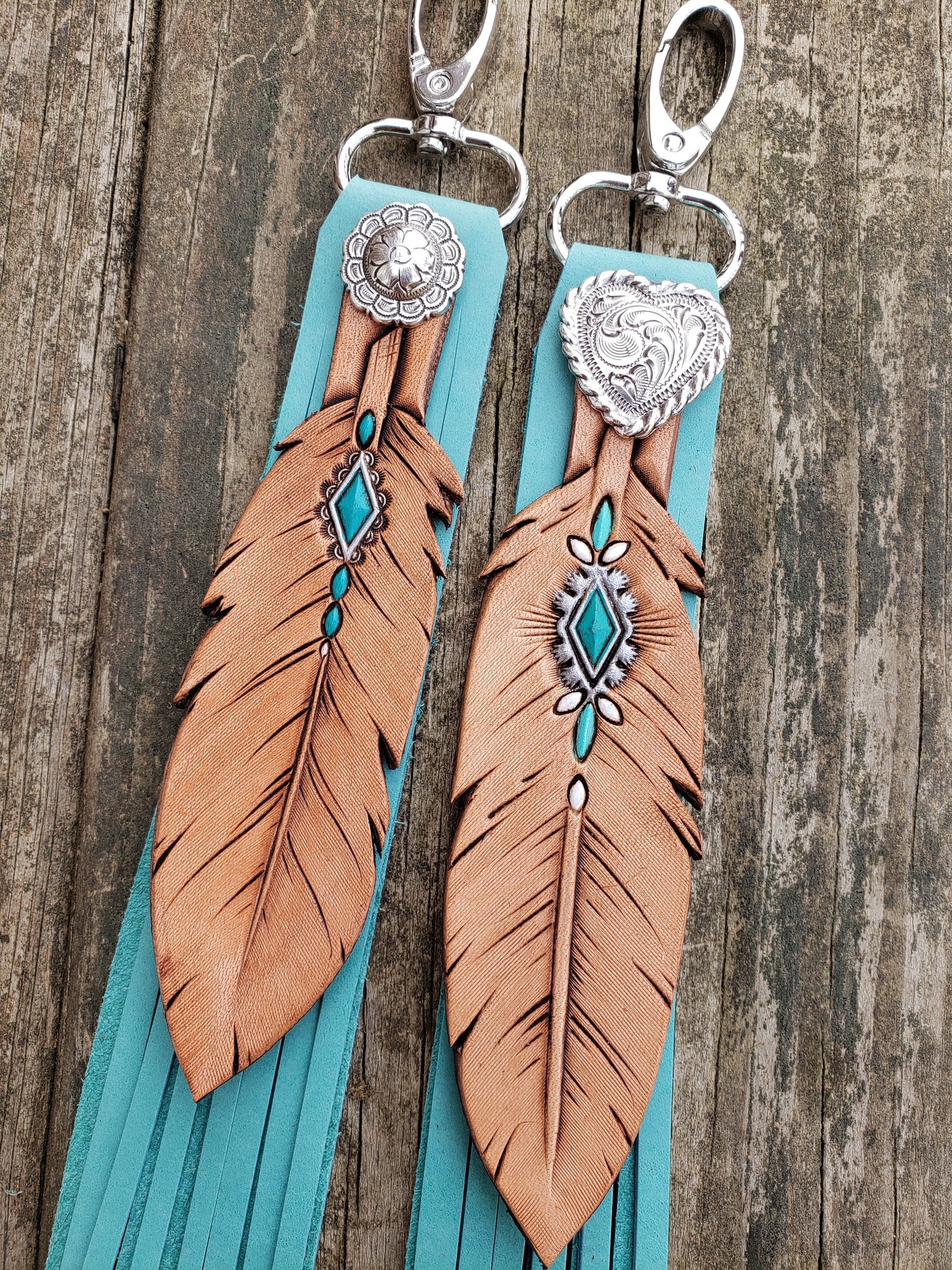 Fringy feather charms with painted turquoise accents and turquoise fringe