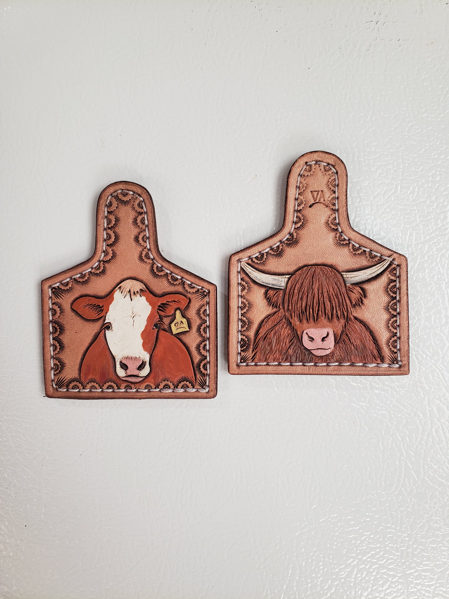 Tooled cow tag refrigerator magnets