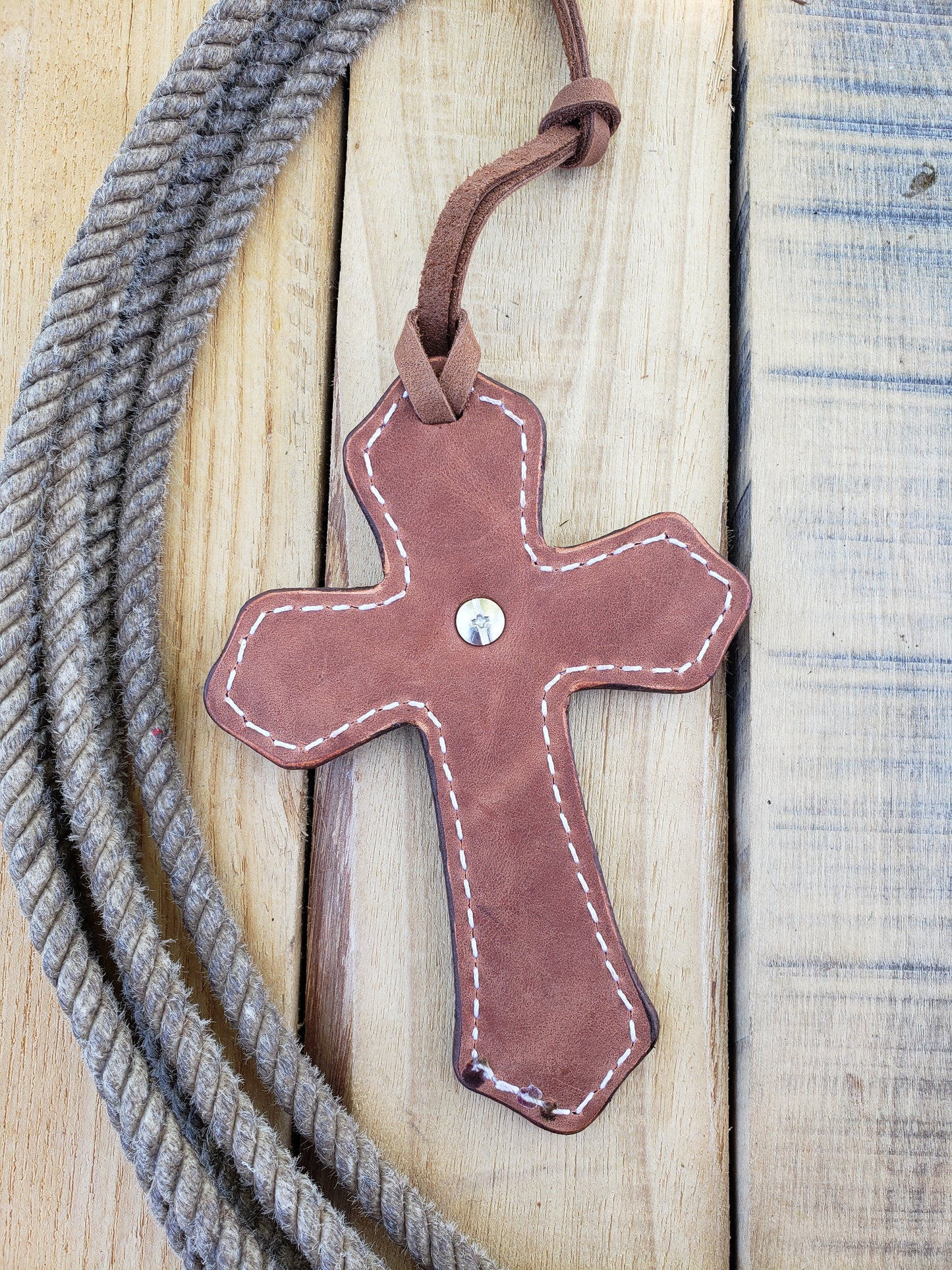 Leather cross charm, geometric with large antique bronze concho