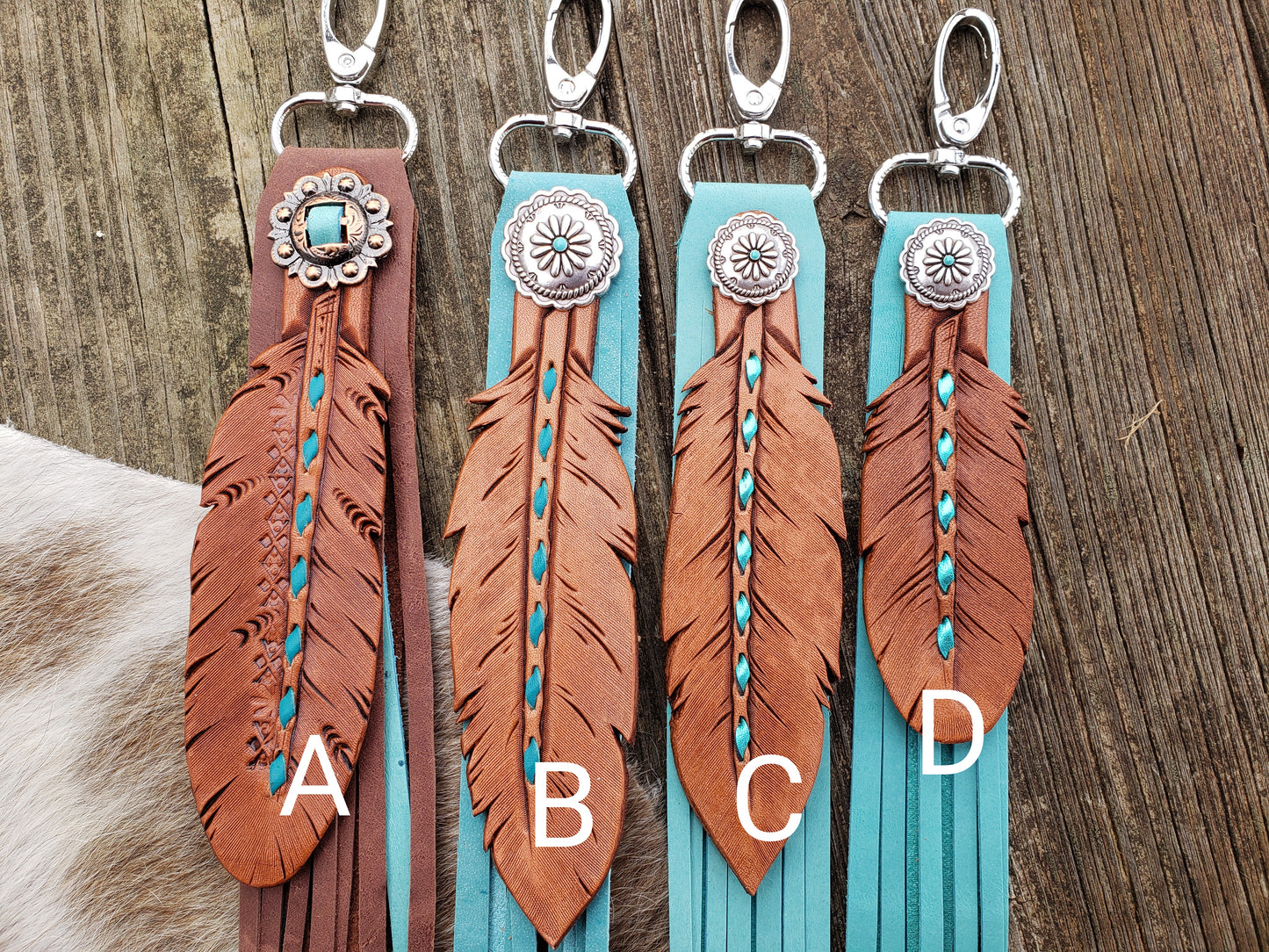 Turquoise buckstitch fringy feather charm