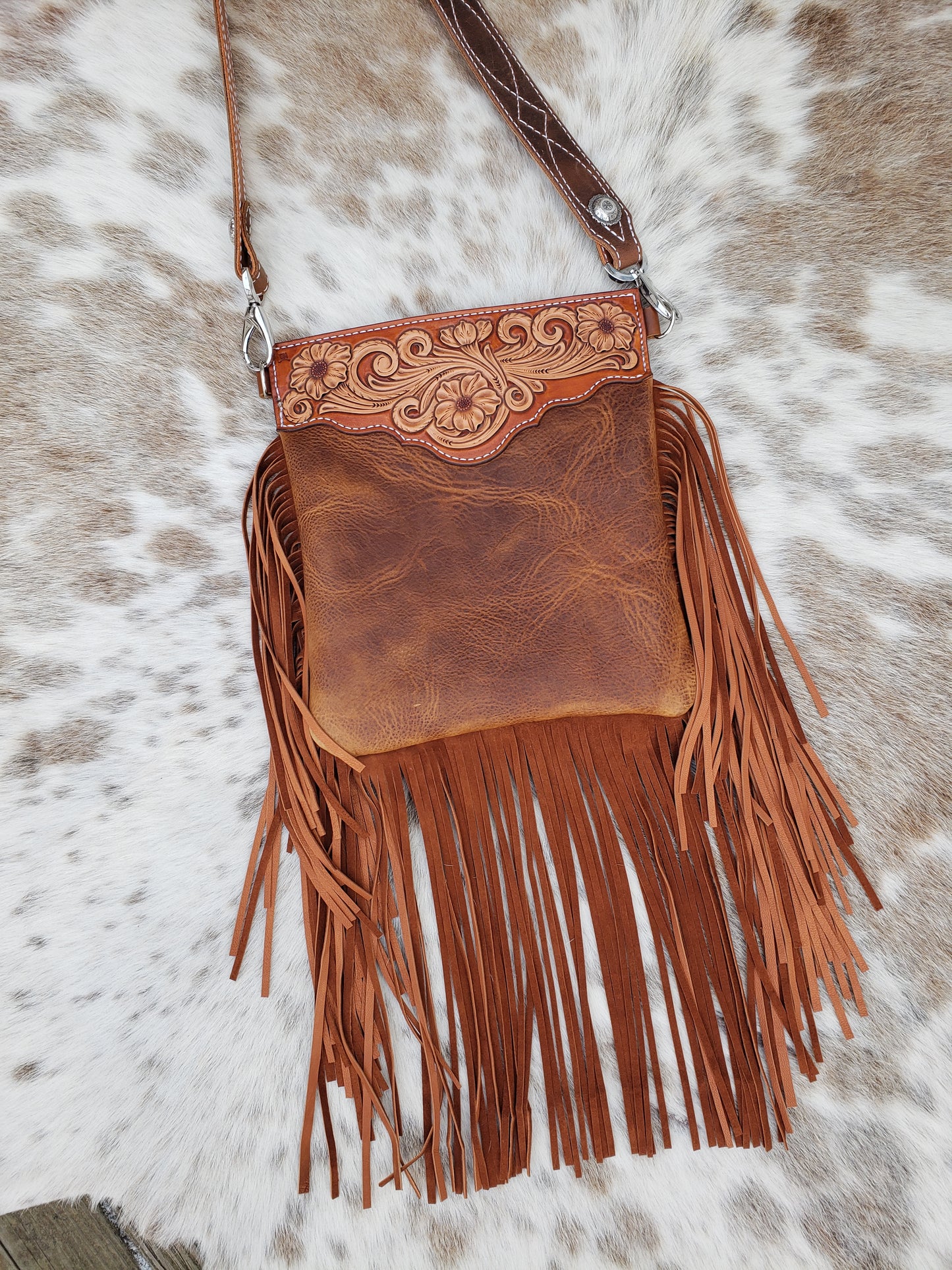 Fringy cowhide and leather bag