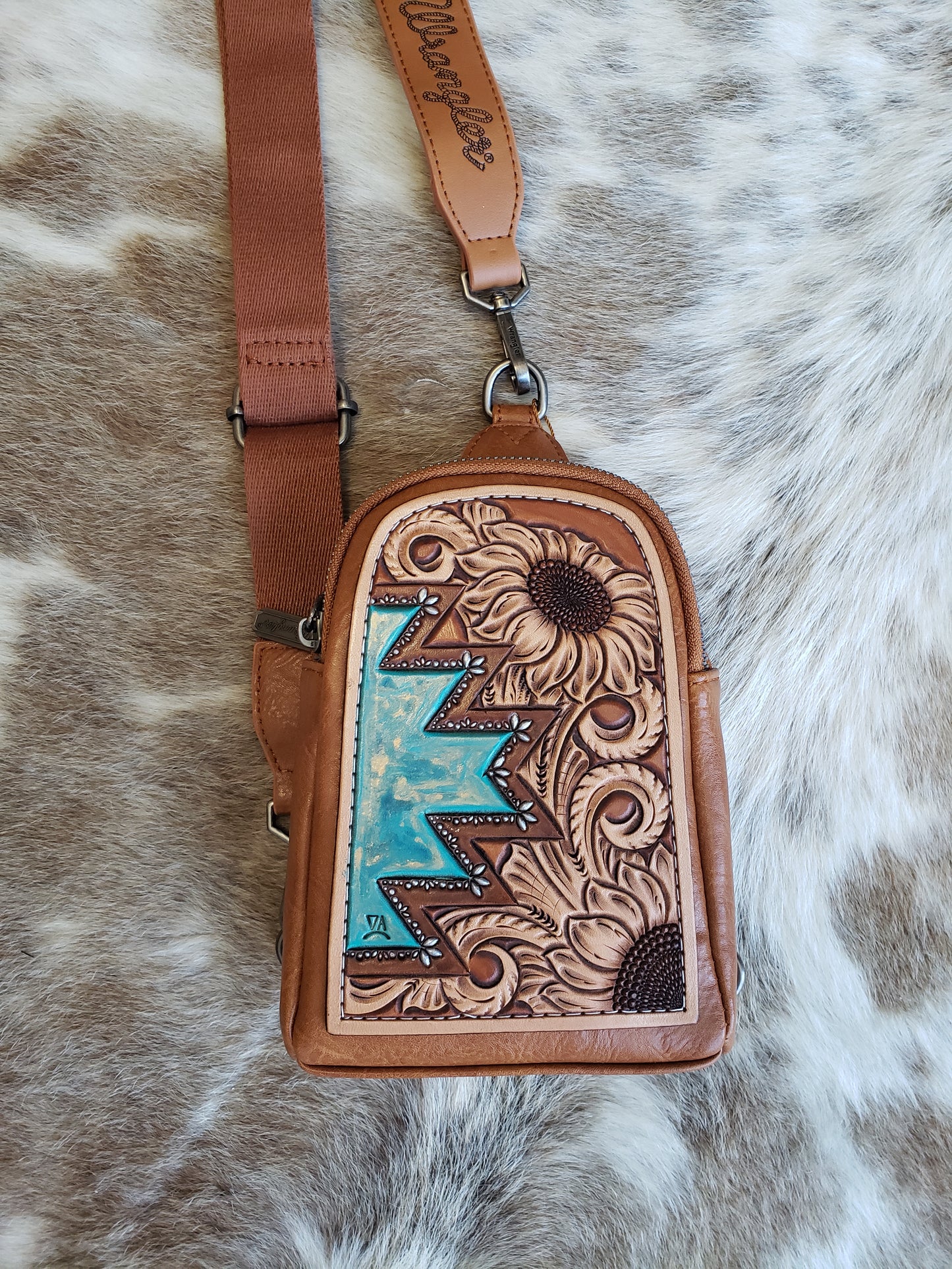 Wrangler sling bag with tooled patch with sunflower and actec design