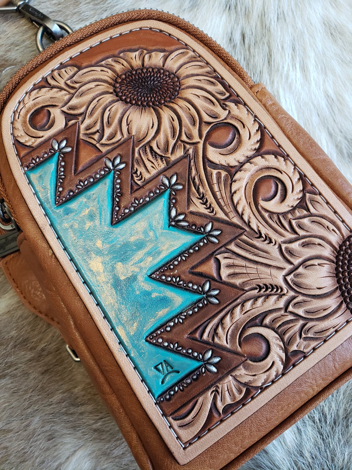 Wrangler sling bag with tooled patch with sunflower and actec design