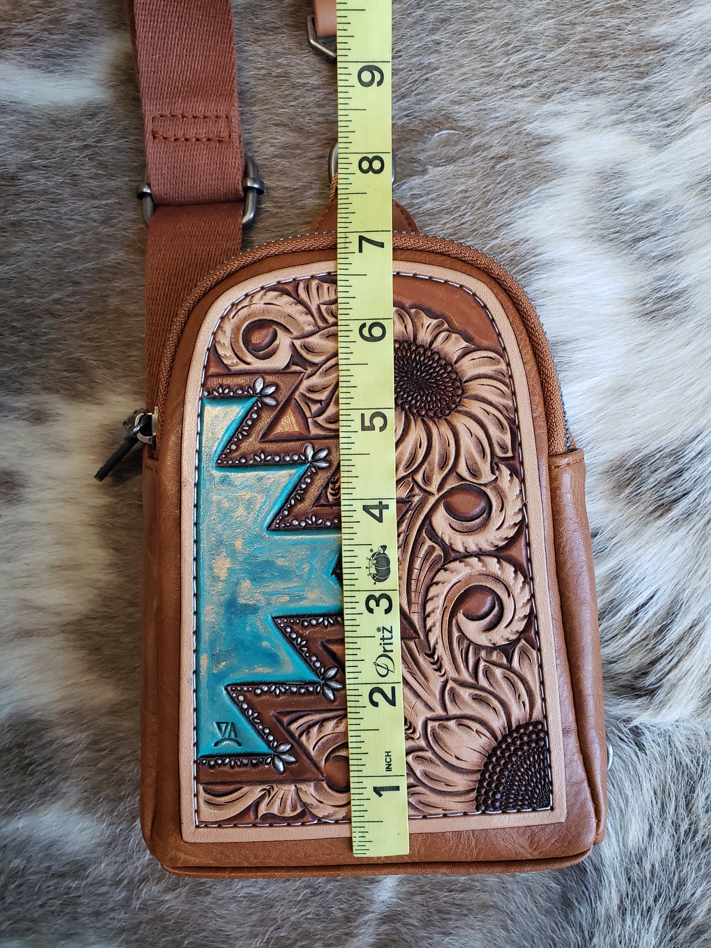 Wrangler sling bag with tooled patch with sunflower and actec design