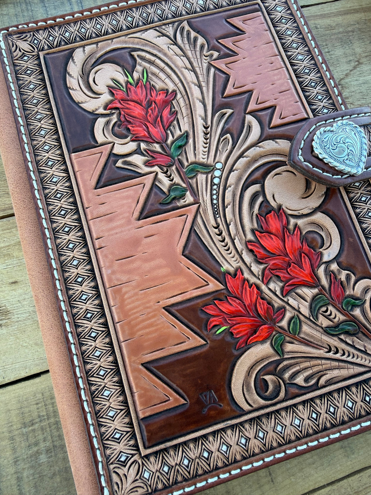 Handmade tooled leather Indian Paintbrush notebook cover