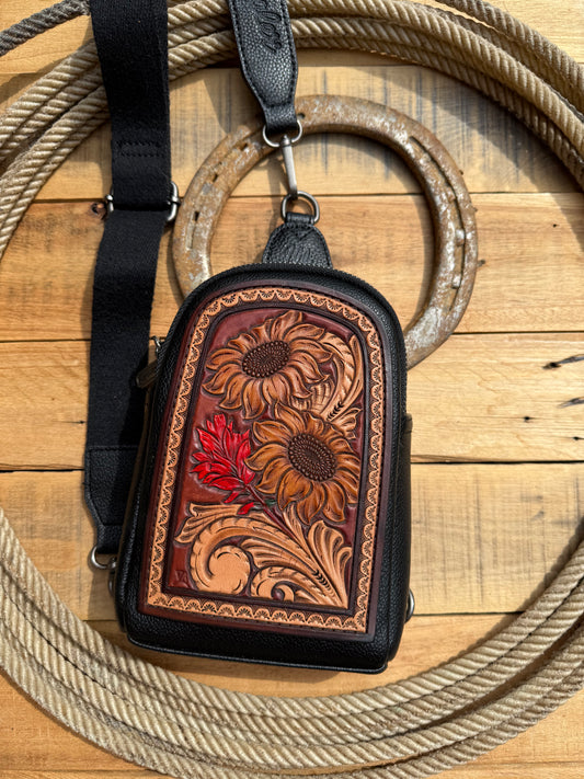 Wrangler sling bag with Indian paintbrush and sunflower tooled patch