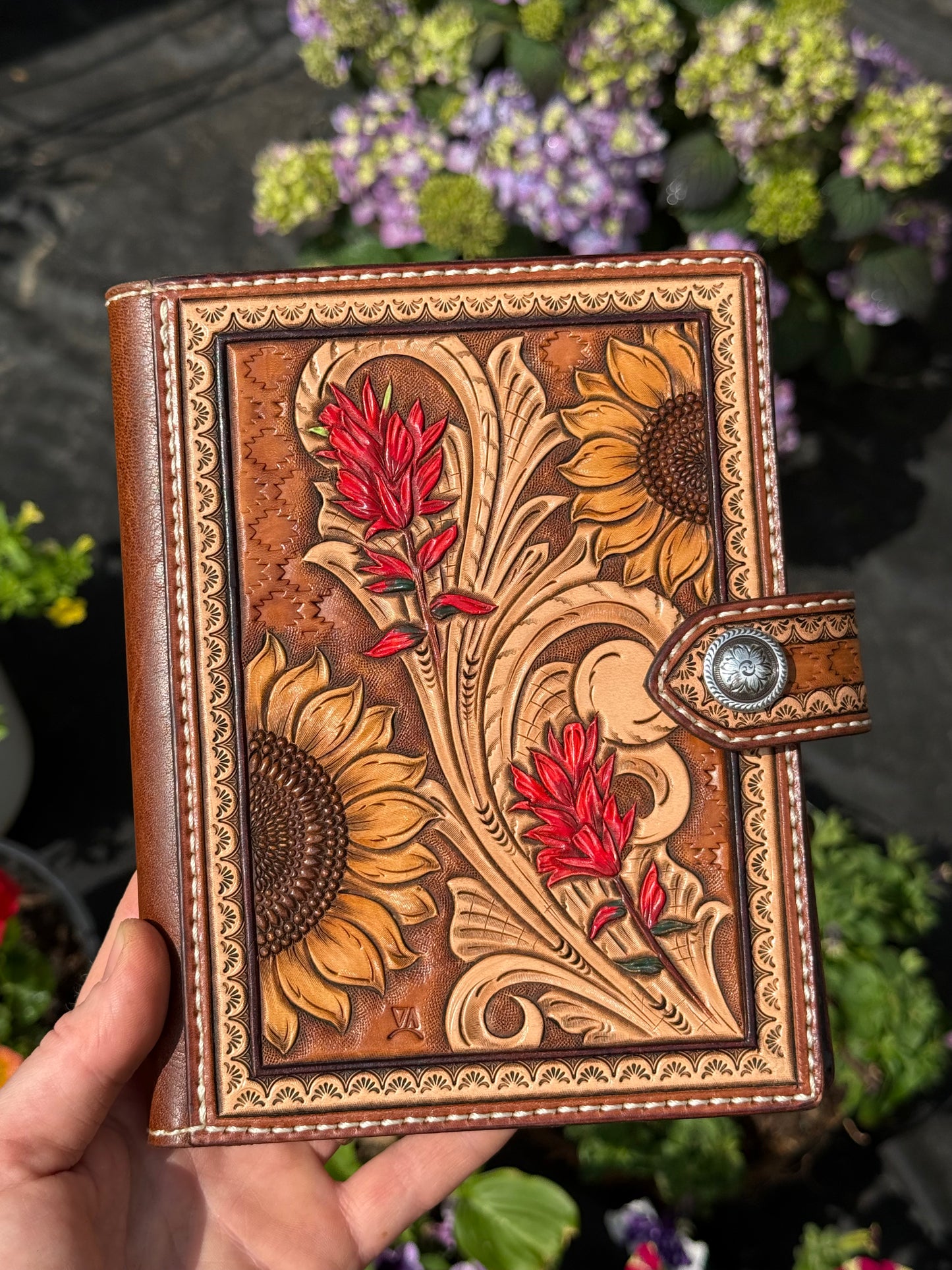 Tooled leather sunflower and Indian paintbrush notebook cover